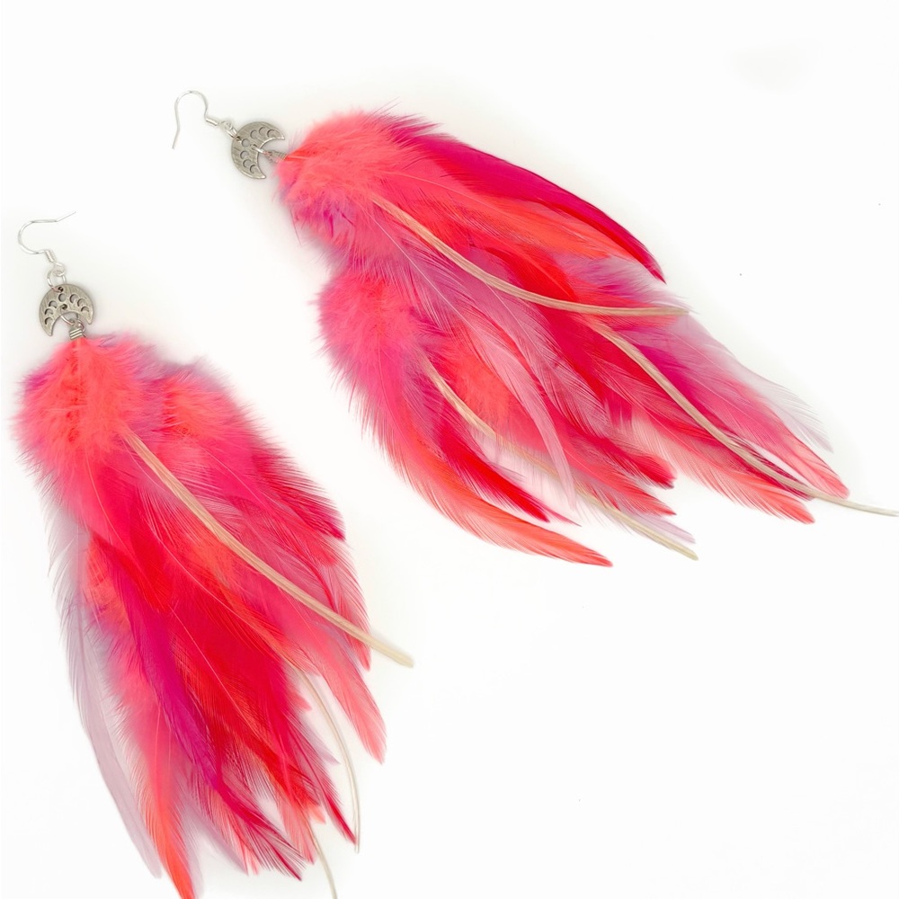 Vibrant Feather Earrings in flamingo pink with silver moon phase pendants